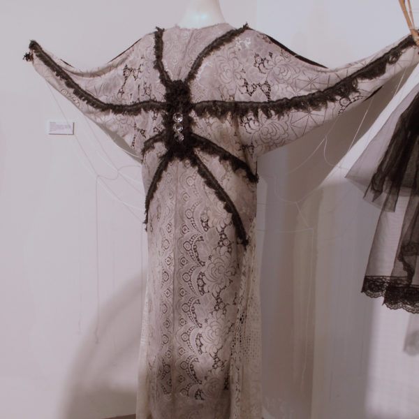 Spider Gown- polar fleece blanket, cotton lace table cloth, synthetic lace table cloth, kite string, selvage, crystal from chandler, baby spiders from child’s costume, jute necklace, size Medium