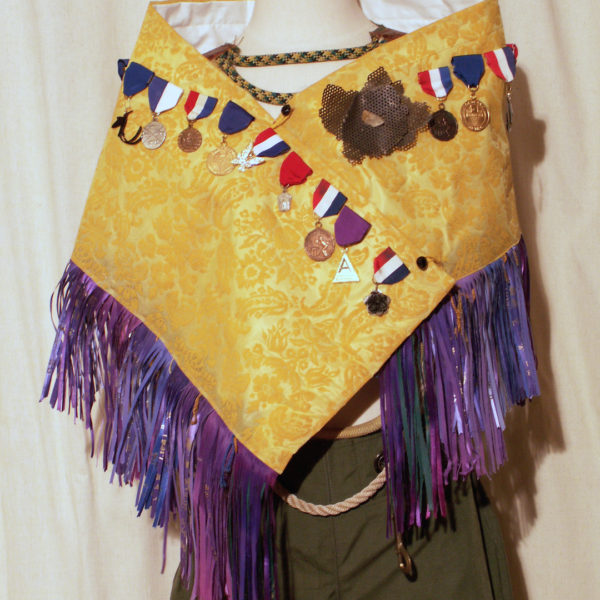 Warrior, Ego Shawl- plastic curtain, first place ribbons, medals, jewelry charms
